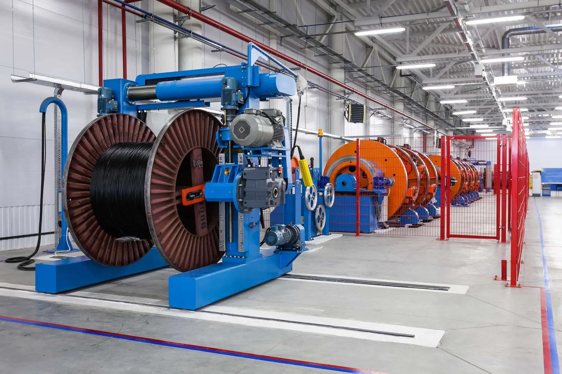 Extrusion machine equipped with Rainbow Rubber & Plastics extrusion belts