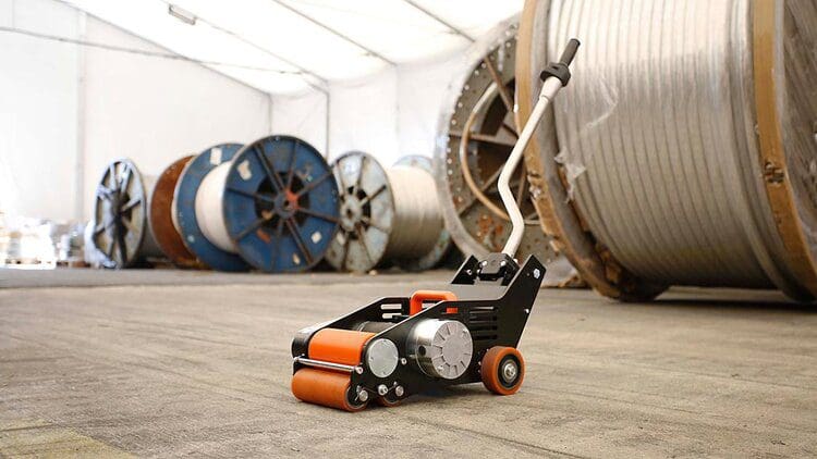 Moviroll in a warehouse - Powered roll pusher